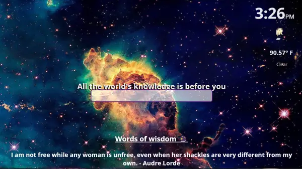 A screenshot of the Realms of Reality Portal, featuring a vibrant, colorful image of a nebula in space as the background. The center displays a search bar with the text, 'All the world's knowledge is before you.' Below the search bar, there's a quote from Audre Lorde that reads, 'I am not free while any woman is unfree, even when her shackles are very different from my own.' The top right corner shows the time, '3:26 PM,' along with the current weather conditions, '90.57°F, Clear,' and a small moon icon.